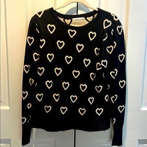 Fun patterned sweater. Puffed sleeve.